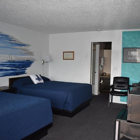 Lighthouse Cove Inn Bandon Exterior foto A typical room at the hotel