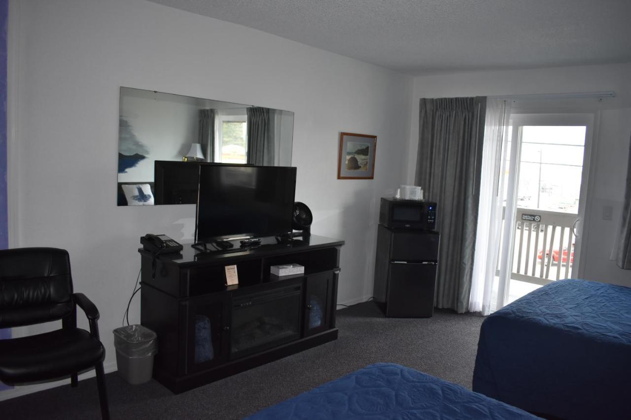 Lighthouse Cove Inn Bandon Exterior foto A typical room at the motel