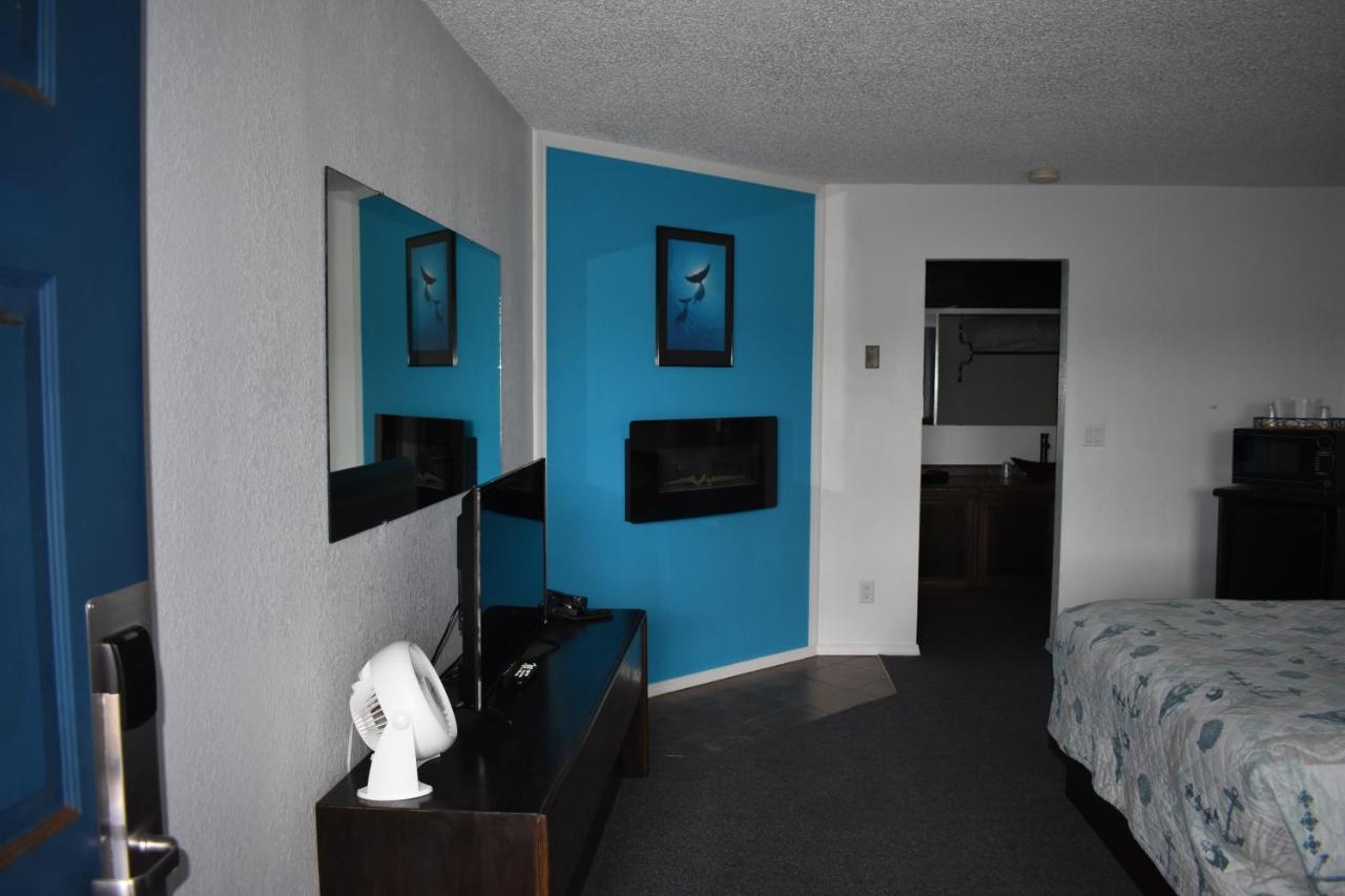 Lighthouse Cove Inn Bandon Exterior foto A room at the motel